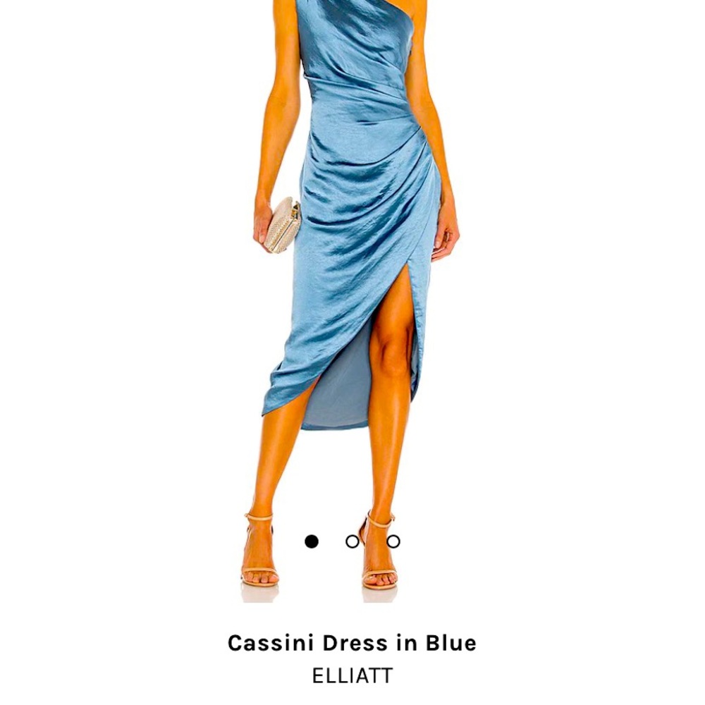 One shoulder cocktail dress. Has a slight slit in the front. Never worn